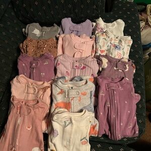 Assorted Baby Onesies in Purple, Pink, and White